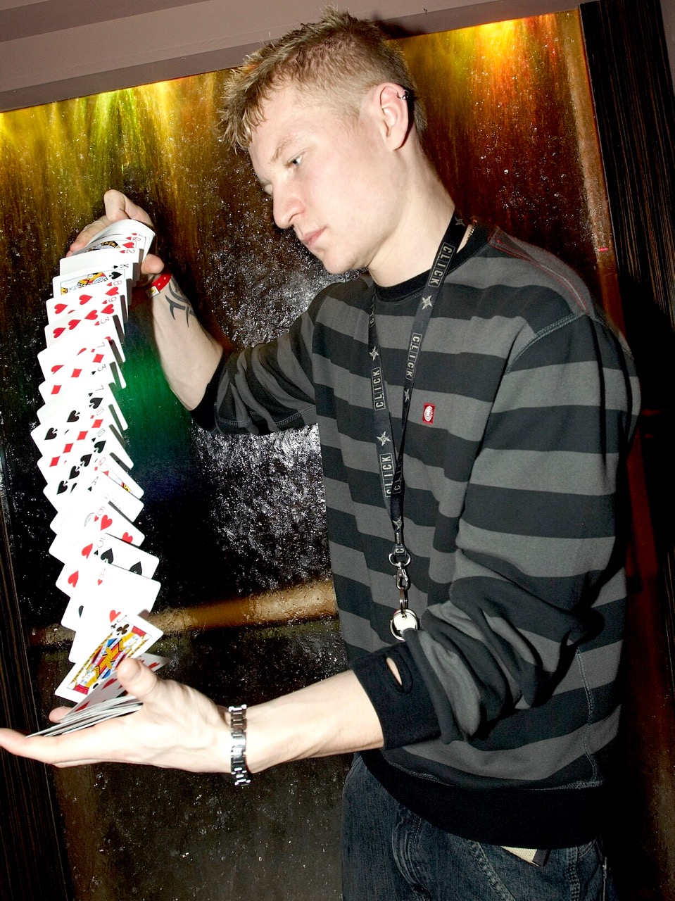 Street Magician Liam Walsh performing close up magic at MTV Party Funky Buddha Nightclub in London